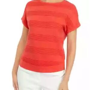 Pretty Orange short sleeve top. Popular  color w/subtle stripe design. NWT